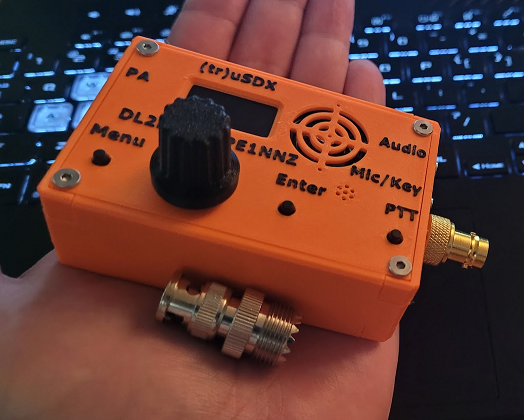 Orange (tr)uSDX in my hand